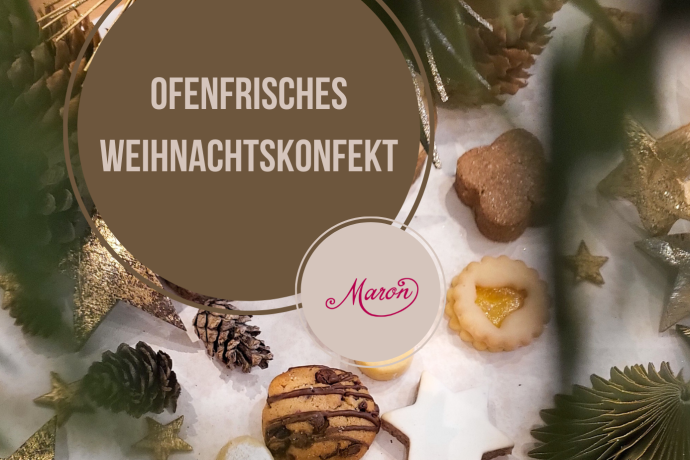 Weihnachtsgebäck und festliche Deko wie Sterne, Tannenzapfen und Papierornamente liegen auf einem Tablett, darüber ein runder brauner Schriftkreis mit dem Text ‚Ofenfrisches Weihnachtskonfekt‘ und dem Logo ‚Maron‘.