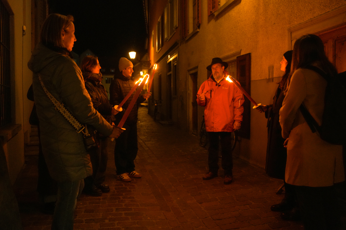 Silvesterführung mit Fakeln durch die Gassen der Churer Altstadt